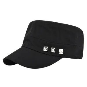 Detail of three silver square metal rivets on a black cotton cadet military cap