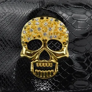 Hip hop black PU snake skin baseball cap with large gold metal skull and rhinestones