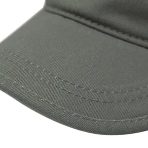 Macro detail of high-density twill cotton visor with triple-row reinforced stitching