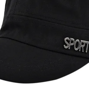 Detailed macro view of black cotton twill fabric and silver metal SPORT emblem on the cap