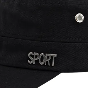Close-up of black military cap featuring SPORT metal logo and breathable mesh eyelets
