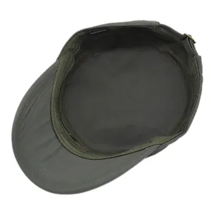 Detail of army green cotton cap interior with 100% cotton label and metal buckle