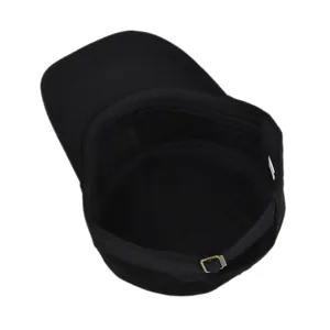 Detail of black canvas military cap interior featuring the metal buckle and adjustable strap