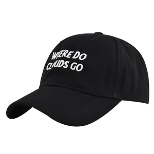 Detail of white 3D embroidery text on black cotton baseball cap with casual design
