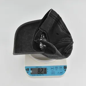 Detailed scale view showing the 82g lightweight of the washed cotton baseball cap
