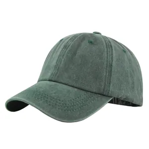 Detailed close-up of dark green washed cotton baseball cap with six-panel construction