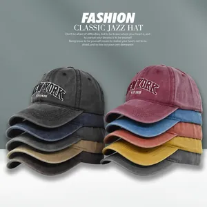 Close-up of vintage washed cotton baseball caps with New York embroidery in various colors
