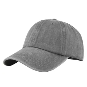 Detail of dark grey washed cotton baseball cap with vintage texture and stitched brim