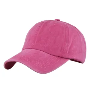 Detailed side view of peach pink washed cotton baseball cap with ventilation eyelets