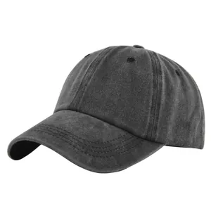 Detail view of washed cotton fabric and embroidery eyelets on vintage baseball cap