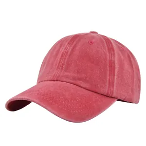 Detail of pink washed cotton baseball cap showing six-panel structure and vent holes