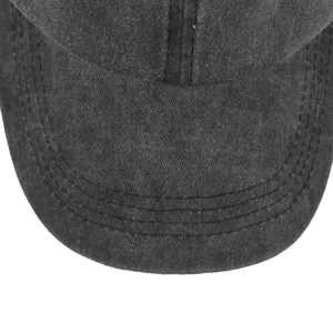 Detailed close-up of parallel stitching on a vintage washed charcoal grey baseball cap
