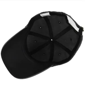 Detail of washed cotton baseball cap inner construction with sweatband and metal buckle
