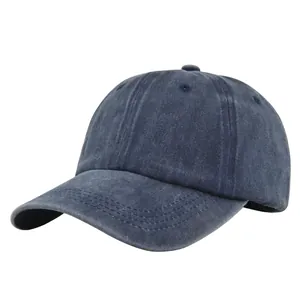 Washed navy blue cotton baseball cap with a classic six-panel design and vintage look