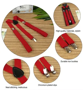 Detail of red elastic Y-back suspenders with chrome clips and black leather joiner