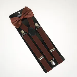 Close-up of coffee brown elastic suspenders and matching bow tie set with metal clips