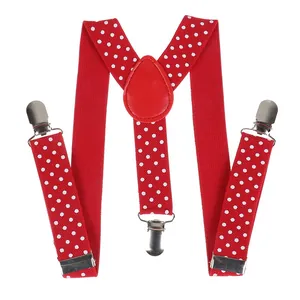 Detail of red and white polka dot Y-back elastic suspenders with silver metal clips