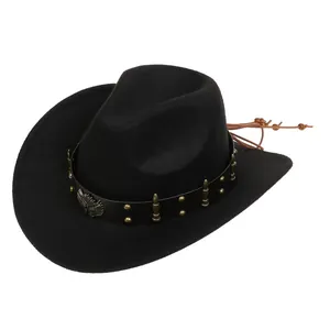 Detail of western hat featuring leather band with metal bullet studs and eagle badge