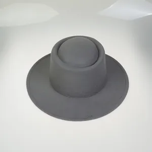 Top-down view showing the unique structured crown and felt texture of this dark grey hat