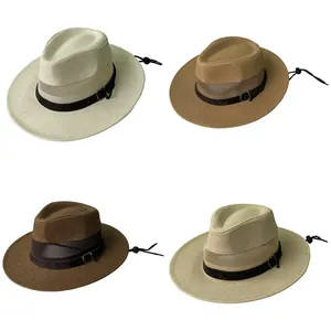 Detail of four straw sun hats showing mesh ventilation bands and adjustable wind ropes