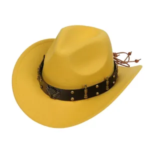 Detail of yellow wool fedora hat with western leather band, metal studs and eagle badge