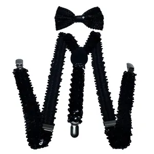 Detail of black sequin bow tie and Y-back suspenders with silver metal clips for parties