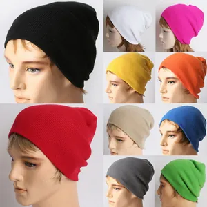 Collage of ribbed knit beanies in multiple colors including black, red, and blue