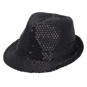 Detailed close-up of glossy black sequins on a classic jazz fedora for stage performance