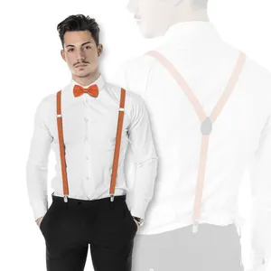 Men's orange Y-shape elastic suspenders and matching bowtie set on white shirt