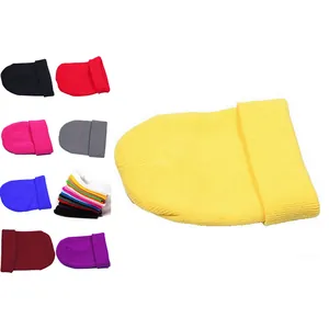 Detailed texture of colorful ribbed knit beanies with a focus on yellow cuffed style