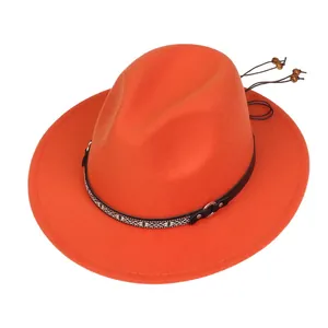 Detailed view of bright orange wool fedora with ethnic woven leather band and metal ring