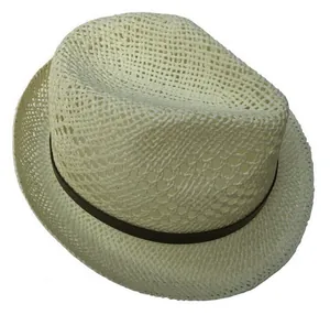 Close-up of cream straw fedora hat featuring breathable hollow weaving and brown strap