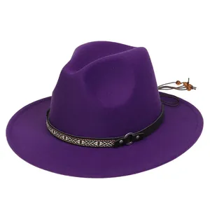 Detail of purple fedora hat featuring woven leather band and decorative wooden beads