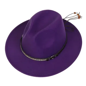Detail of purple wool fedora hat featuring ethnic woven band and wooden bead charm
