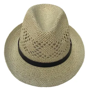 Close-up of beige straw fedora hat featuring detailed weave and black decorative ribbon