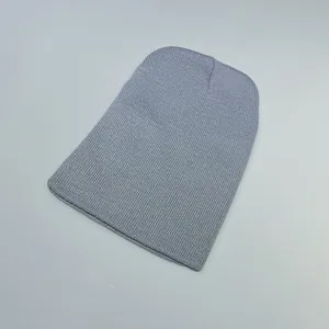 Detailed close-up of light blue ribbed knit beanie showing texture and thick warmth