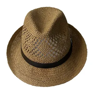Detail of breathable hollow-weave straw jazz hat with black leather buckle and ribbon