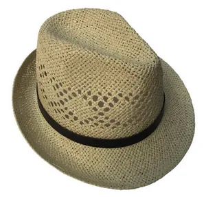 Close-up of woven straw fedora hat with coffee brown ribbon and indented crown
