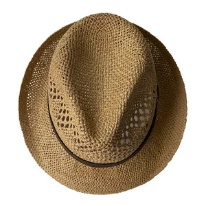 Close-up of woven straw jazz hat featuring breathable mesh texture and dark decorative band