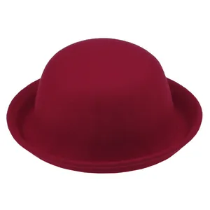 Detail of the high-quality dark red wool felt bowler hat with a vintage curled brim