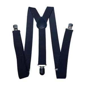Dettaglio delle bretelle a Y blu scuro con fasce elastiche e tre clip in metallo argento