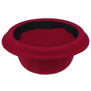 Detail of red wool bowler hat showing internal 100% wool label and inner sweatband