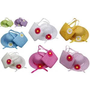 Close-up of children's straw hats and matching daisy bags in eight vibrant summer colors