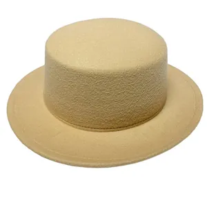Detailed macro view showing the texture of a beige wool felt flat top boater hat