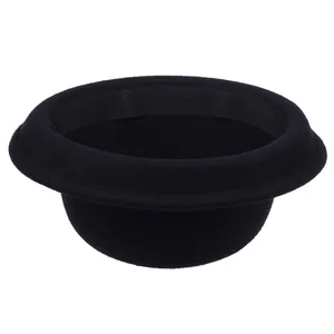 Detail view of the interior structure and inner sweatband of a black wool bowler hat