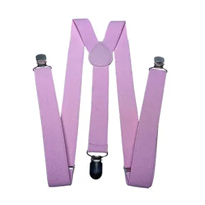 Dettaglio di bretelle rosa elasticizzate a Y con clip in metallo e giunto in pelle
