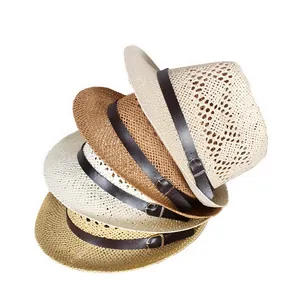 Detail of four straw fedora hats in various colors with leather buckle bands and woven texture