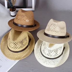 Detail showing various straw Panama hats with leather buckles and breathable texture