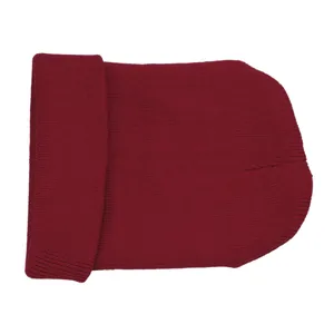 Detailed close-up of dark red knitted beanie featuring vertical ribbed texture and cuff