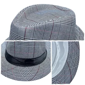 Detail of men's summer fedora with black and white plaid pattern and white sweatband